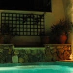 Pool waterfall at night Pool waterfall at night